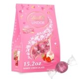 Lindt LINDOR Strawberries and Cream White Chocolate Candy Truffles, Valentine’s Day White Chocolate with Strawberries and Cream White Truffle Filling, 15.2 oz. Bag